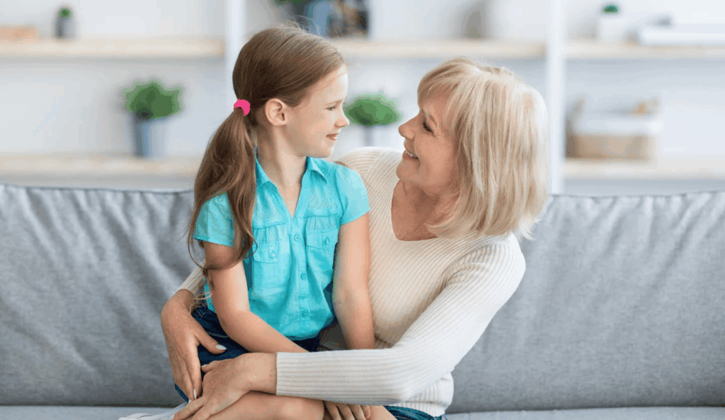 Grandmother and granddaughter hugging